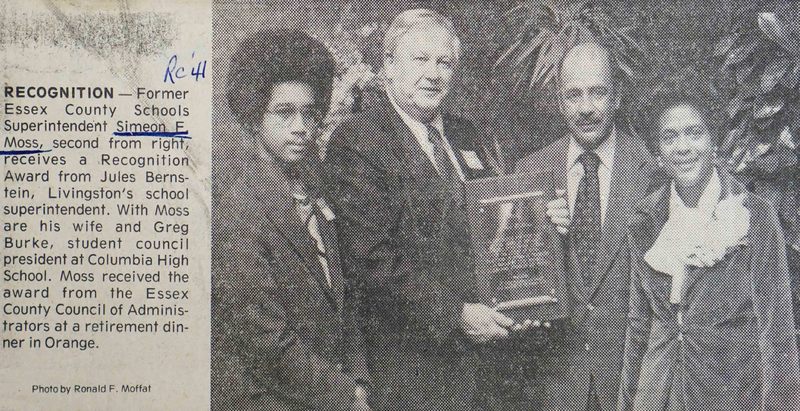 Photograph of Simeon F. Moss receiving a Recognition Award from the Essex County Council of Administrators