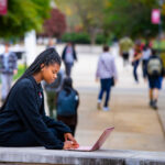 Student studying on Livingston Campus